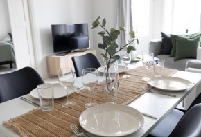 2ndhomes Central 2BR Apartment with Sauna & Balcony